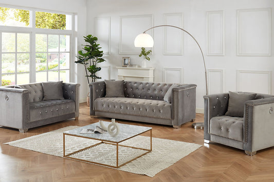 Grey Velvet With Deep Tufting and Nailhead Details, Chrome Legs, Accent Ring and Pillows.