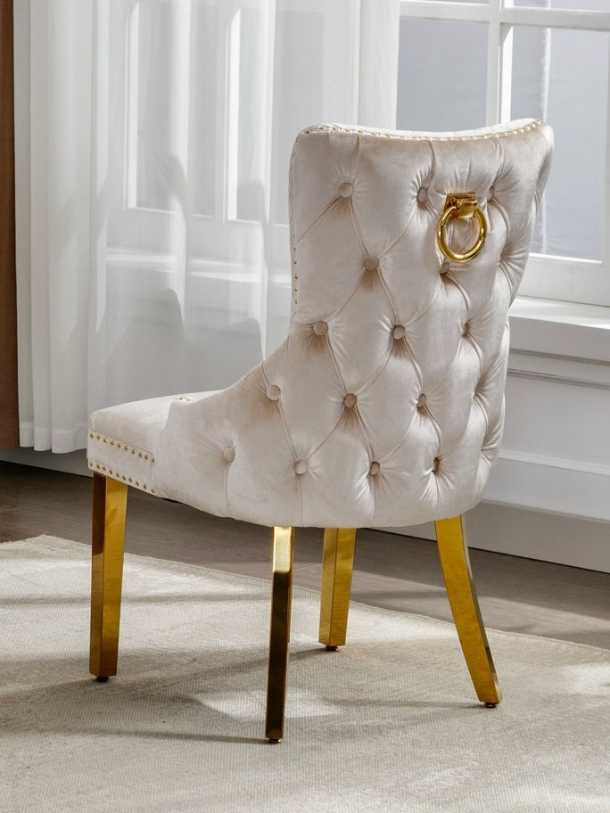 Creme Velvet Dining Chair with Large Knocker, Polished Gold Frame, Deep Tufting back and Nail Head Details. SET OF 2