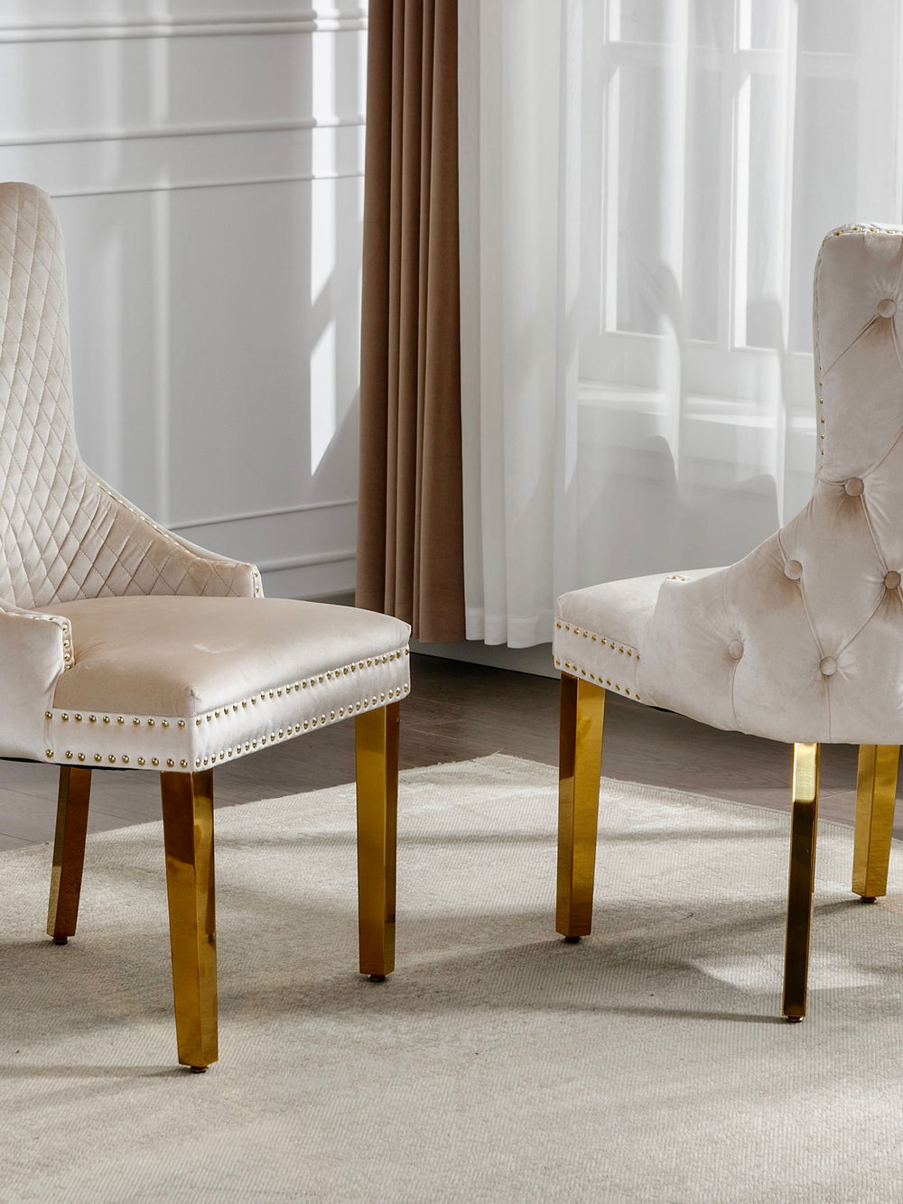 Creme Velvet Dining Chair with Large Knocker, Polished Gold Frame, Deep Tufting back and Nail Head Details. SET OF 2