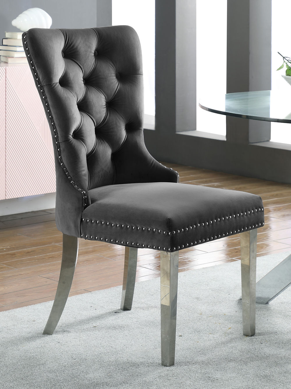 Grey Velvet Dining Chair,Chrome Knocker, Polished Chrome Frame,
Button Tufted Front Nailhead Details (SET OF 2)