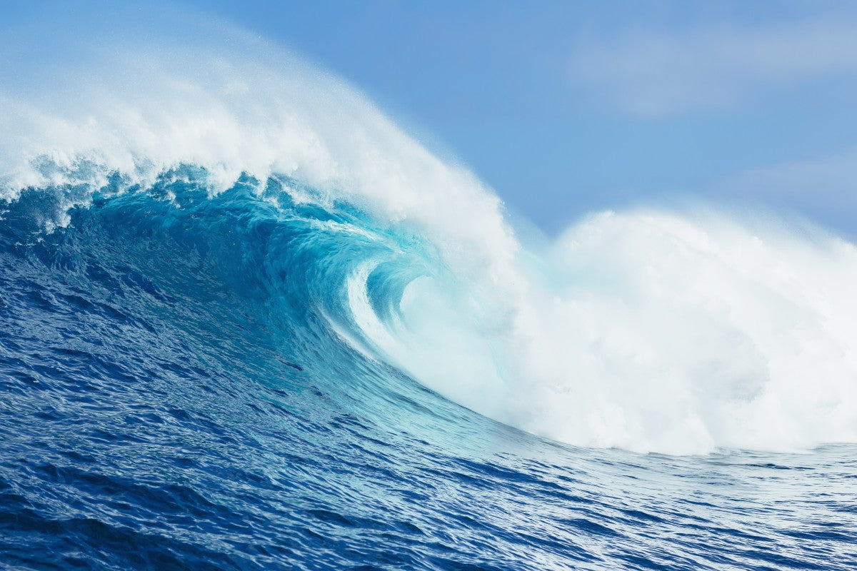 A large ocean wave breaks at the big wave spot know as Jaws or Peahi; Maui, Hawaii, United States of America by PacificStock