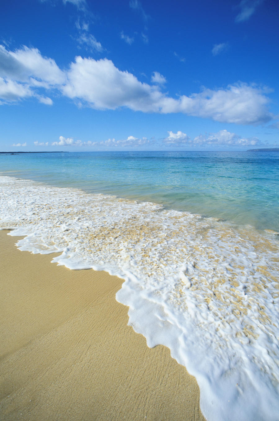 Hawaii, Maui, Makena Beach, Closeup Of Textured Foamy Shoreline, Calm Turquoise Ocean.