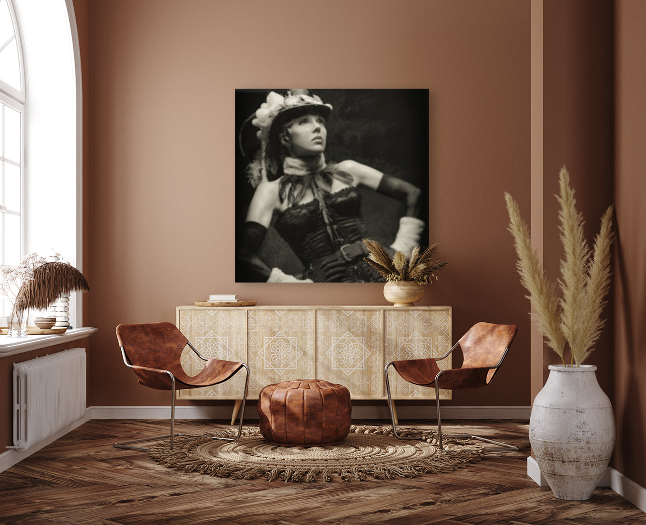 Old-fashioned black and white portrait of a young cabaret showgirl in her stage costume